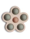 Mushie Press Toy Flower – Jouet sensoriel bébé en silicone