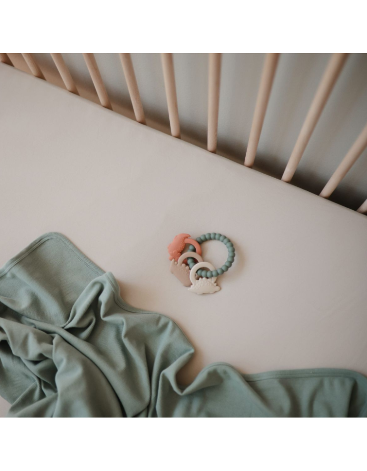 Anneau de dentition Mushie Dino silicone bébé