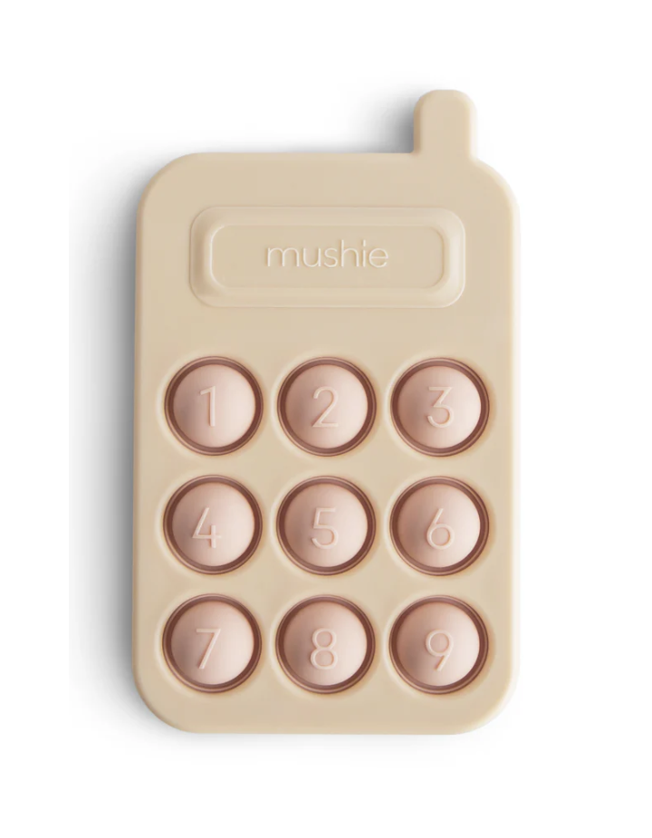 Phone Press Toy Mushie – Jouet sensoriel bébé | 10 mois+